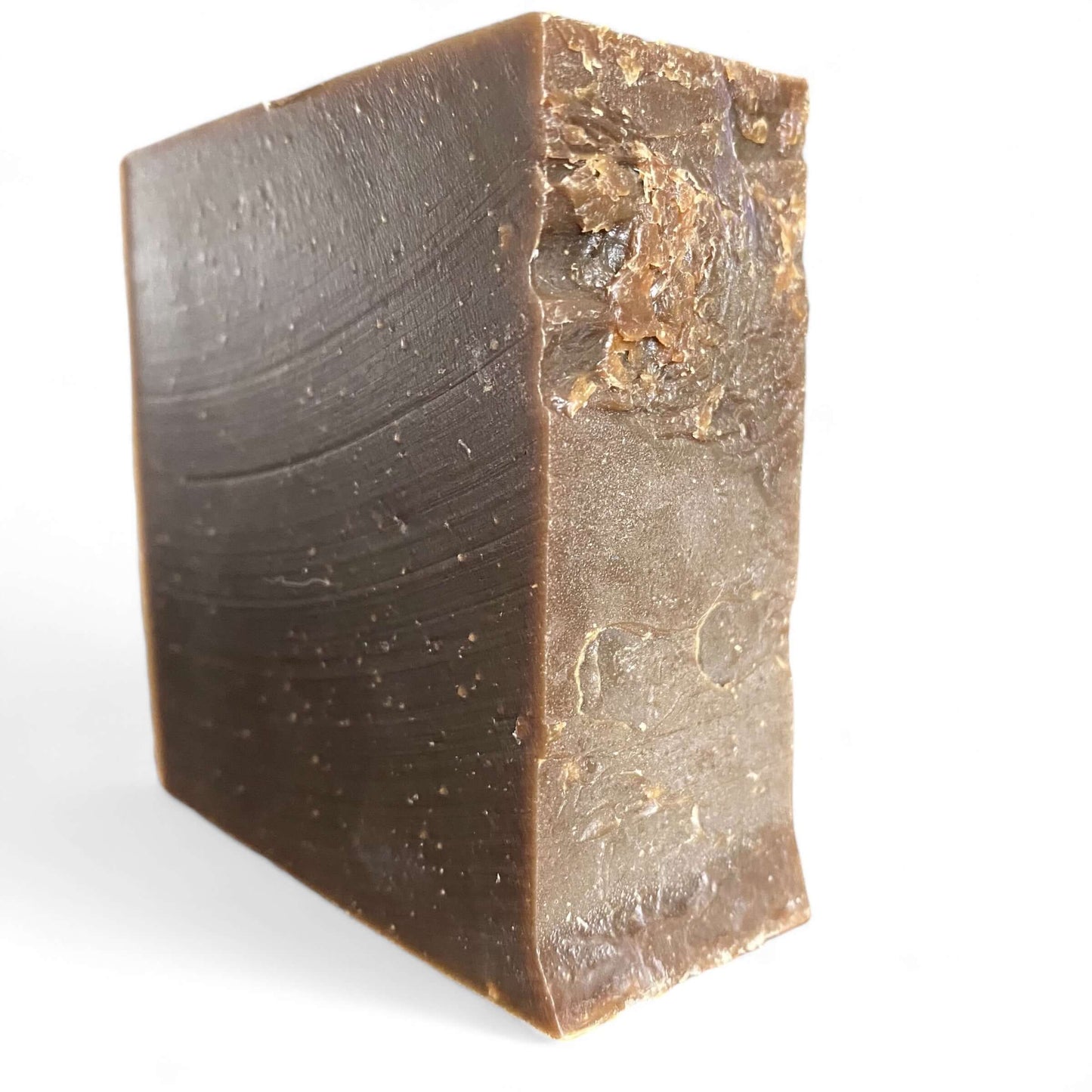 an angled view of a bar of Northern Pine Tar soap - Brick Box Natural Soap Co.