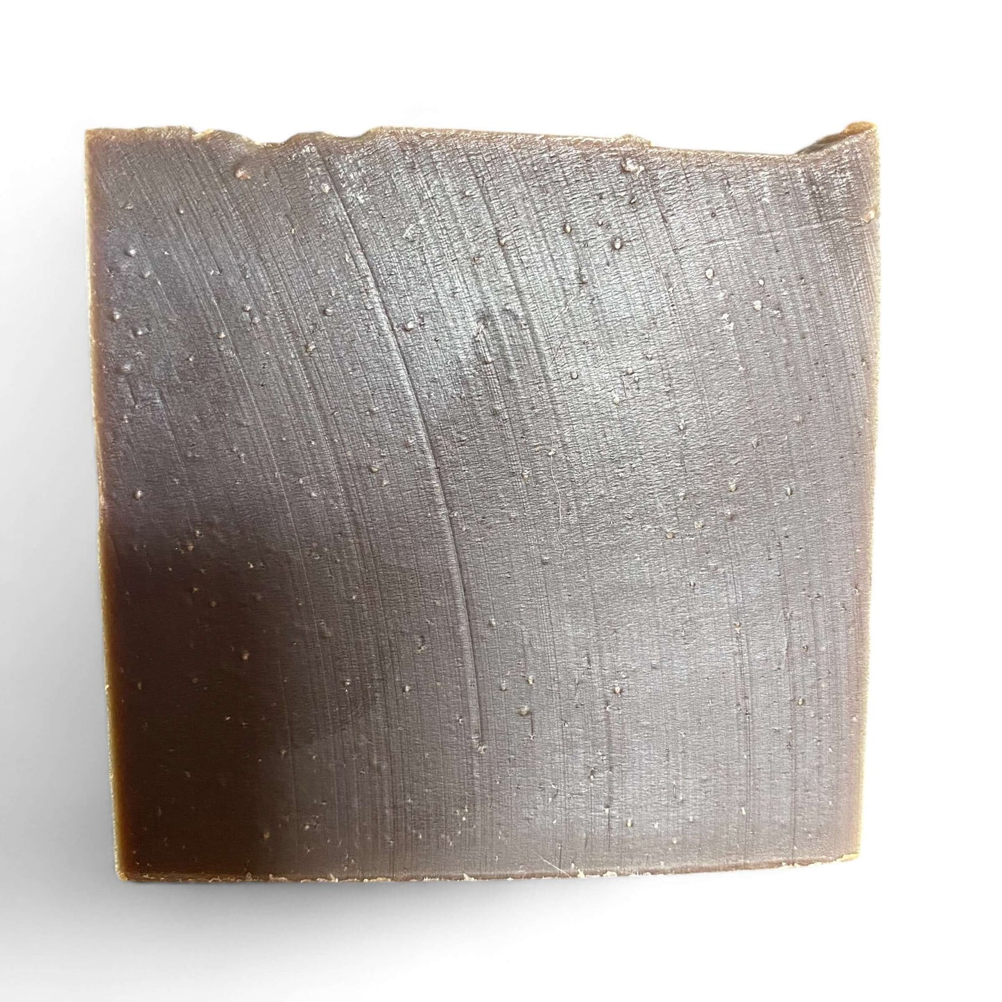 a bar of Northern Pine Tar soap by Brick Box Natural Soap Co.