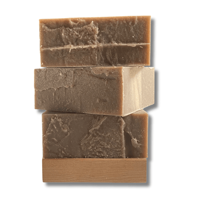 a stack of three bars of Root Beer soap by Brick Box