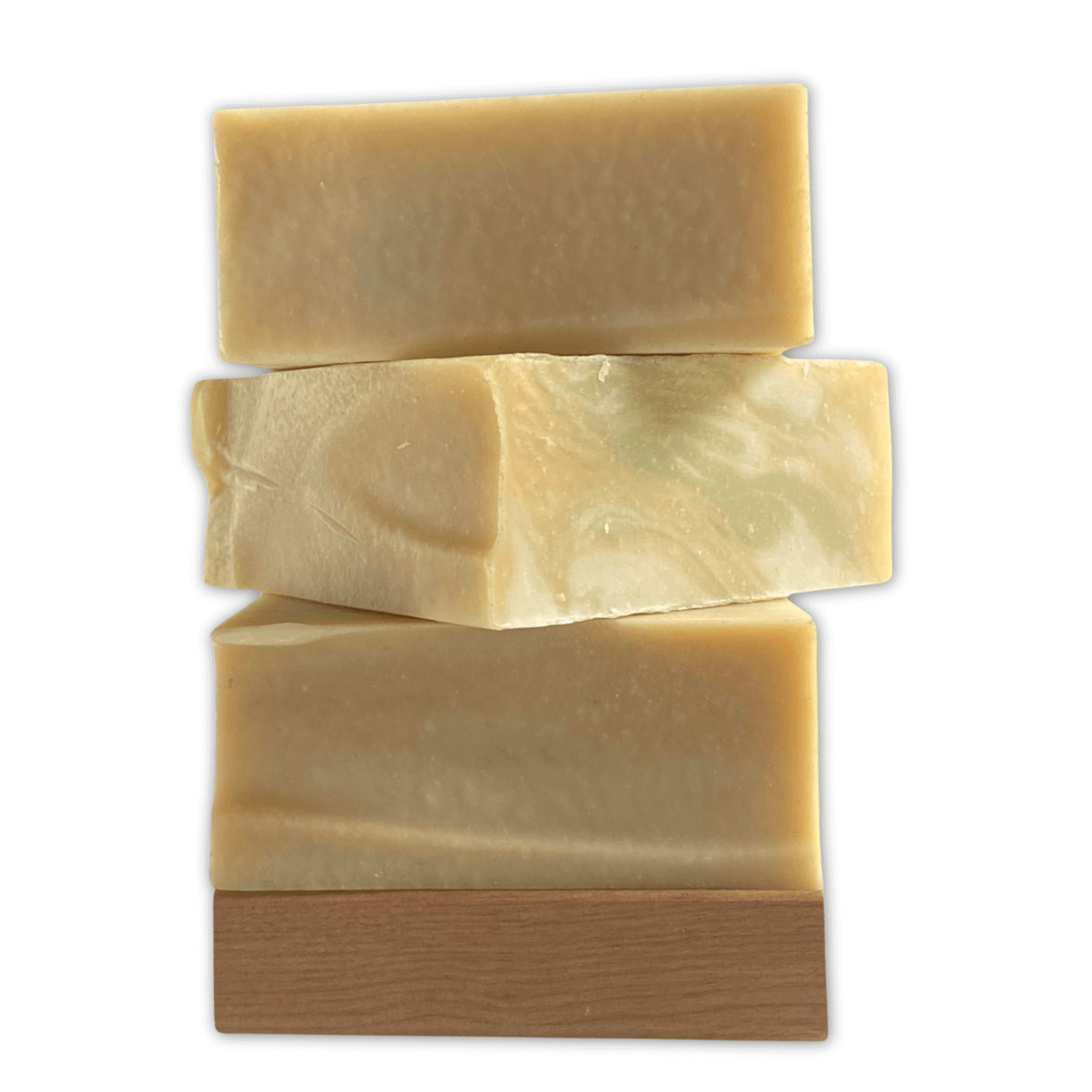 a stack of three bars of Bay Rum Soap by Brick Box Natural Soap Co.