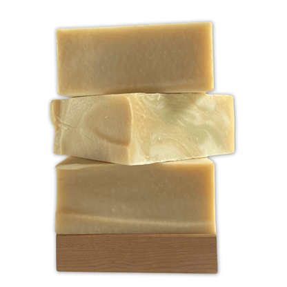 a stack of three bars of Bay Rum Soap by Brick Box Natural Soap Co.
