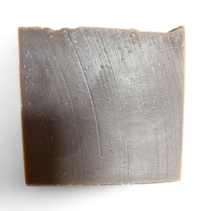 a bar of Northern Pine Tar soap by Brick Box Natural Soap Co.