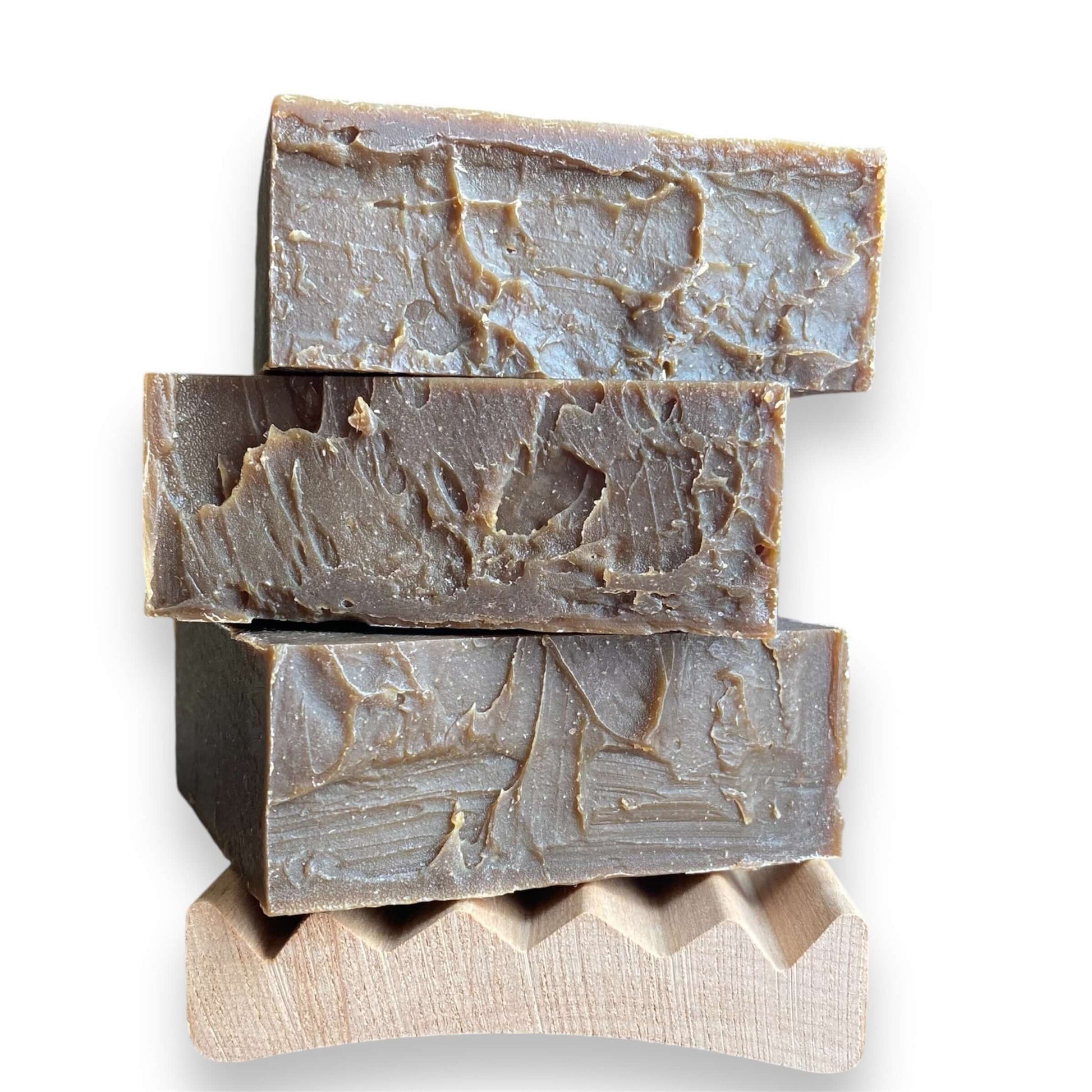 A stack of three bars of Northern Pine Tar soap - Brick Box