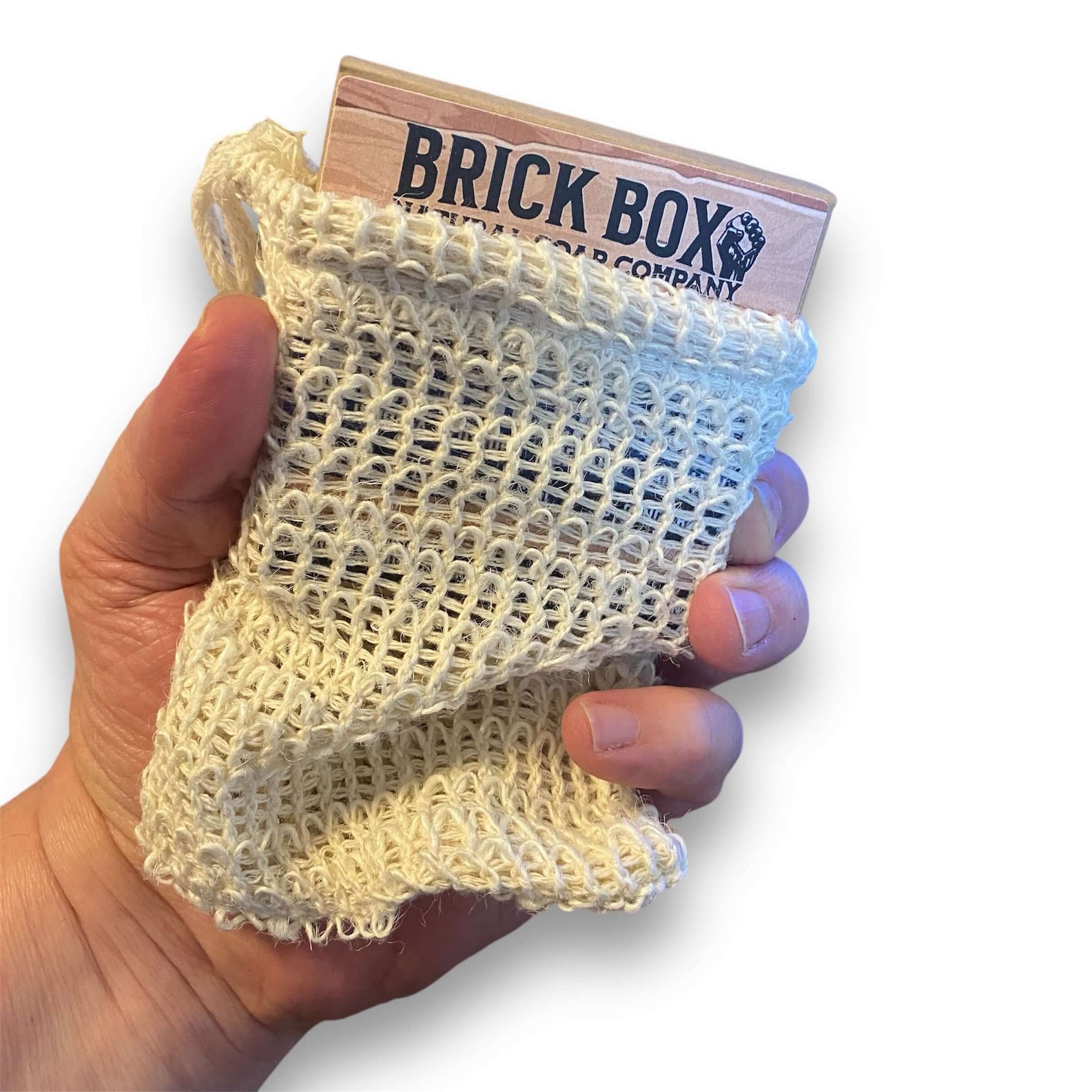 hand holding sisal soap satchel