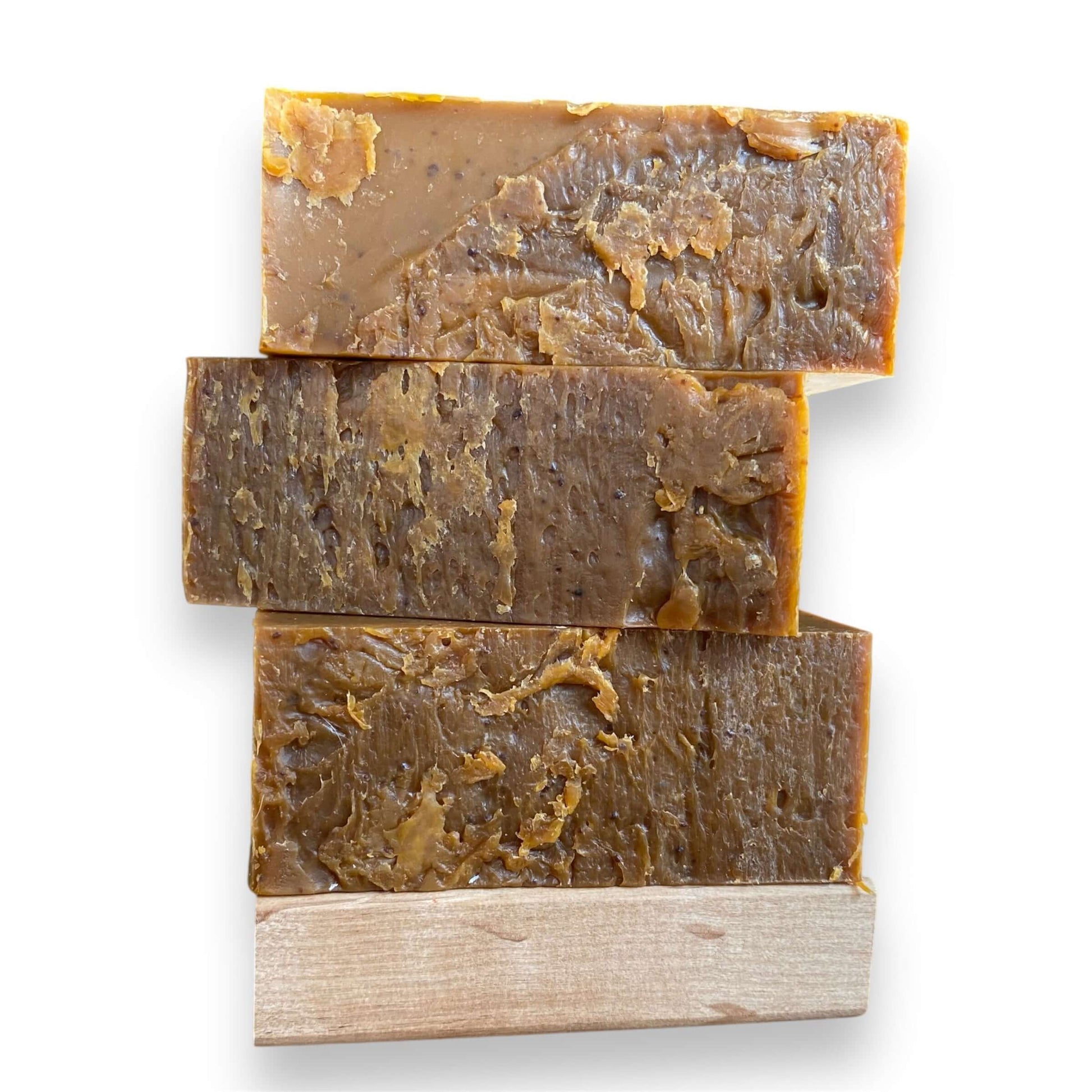 a stack of three Whiskey Barrel soap bars by Brick Box Natural Soap Co.